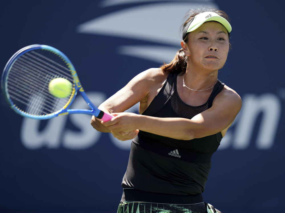 Chinese tennis star Peng Shuai plays during the second round of the U.S.Open tennis championships in 2019. The Women's Tennis Association says they are canceling all tournaments in China after Peng Shuai was silenced after revealing her sexual assault.