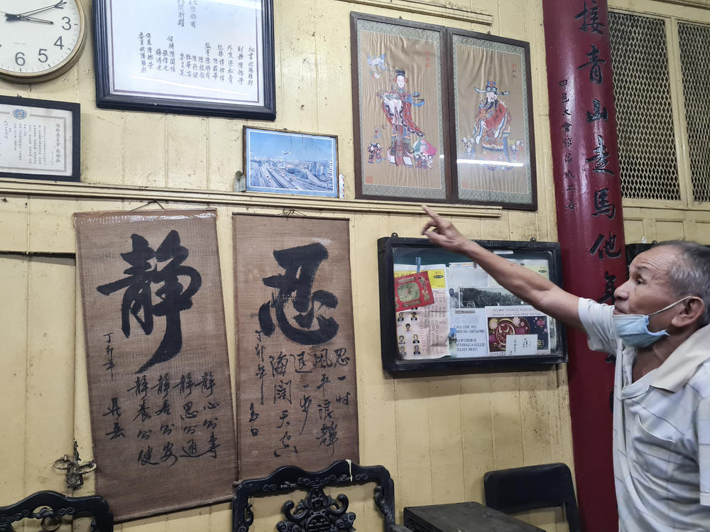 Tony Liu, 70, speaks to NPR inside a Taoist temple in his hometown of Kolkata, India. Liu is a third-generation immigrant to India from China. Some of his Chinese teachers were arrested and sent to prison camps during the 1962 India-China war.