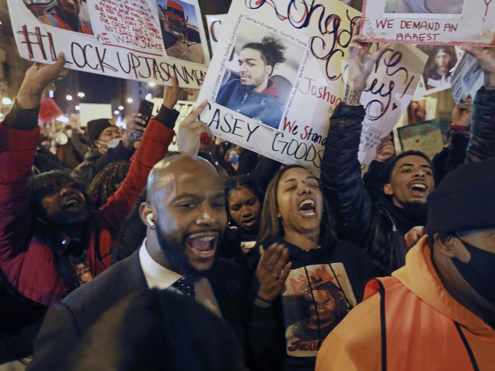 Tamala Payne (center) and attorney Sean Walton participate in a Dec. 11, 2020, protest of the shooting of her son, Casey Goodson Jr., by a Franklin County deputy sheriff in Columbus, Ohio.