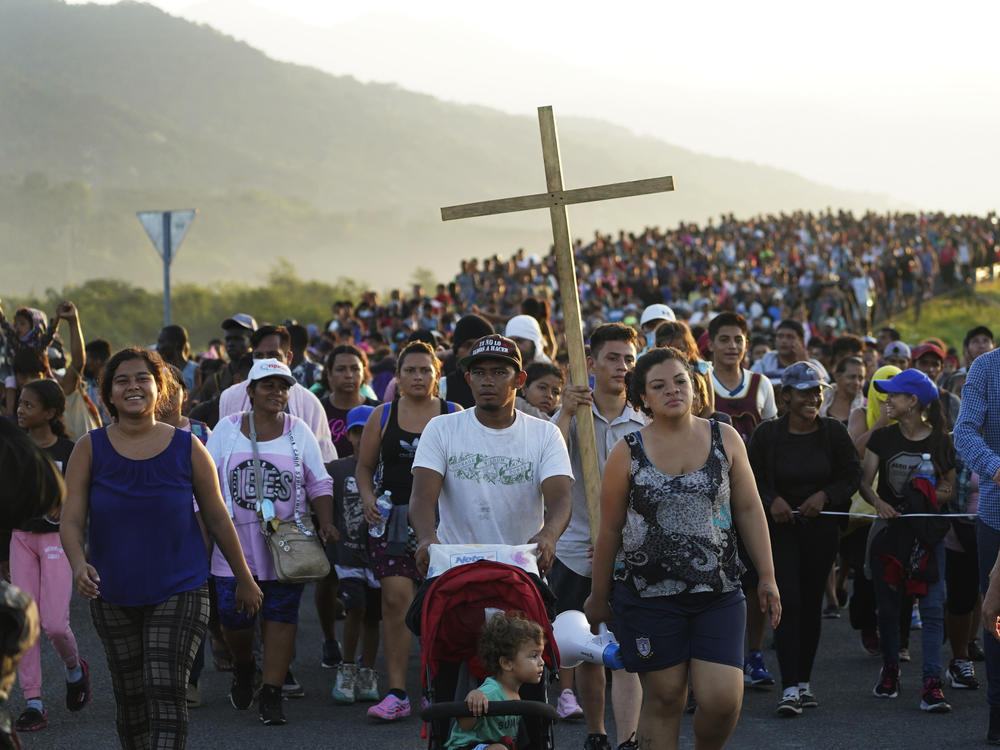 Migrants leave Huixtla, Chiapas state, Mexico, on Oct. 27 as they continue their trek north toward Mexico's northern states and the U.S. border.