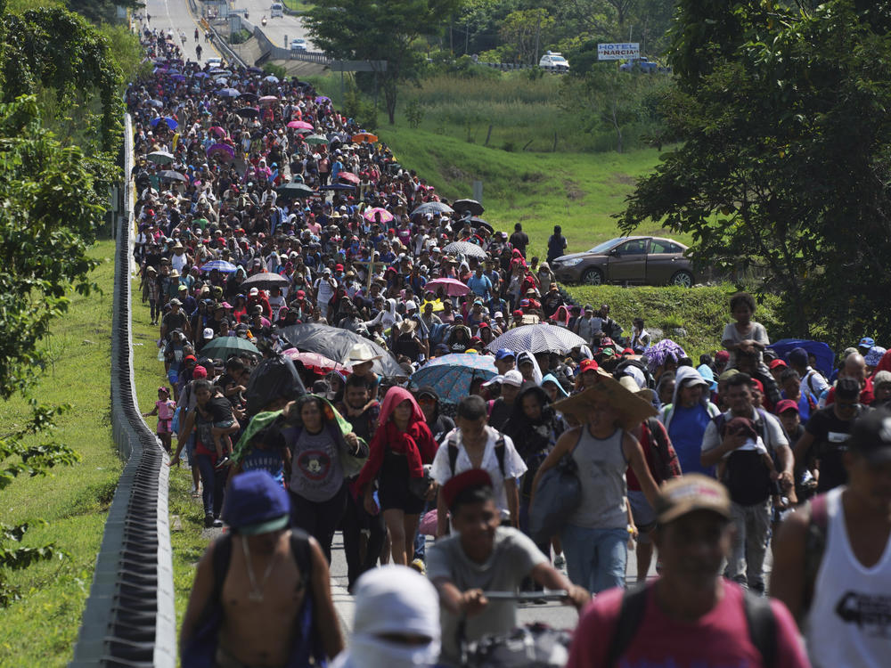 Migrants arrive in Villa Comaltitlan, Chiapas state, Mexico, on Oct. 27.