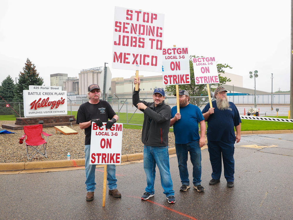 Kellogg workers demonstrate in front of one of the company's cereal plants in Battle Creek, Mich., on Oct. 7