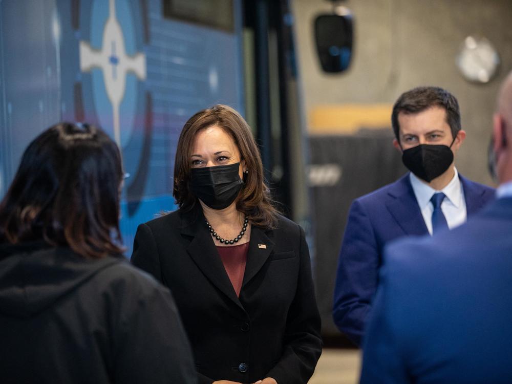Vice President Harris and Transportation Secretary Pete Buttigieg tour electric vehicle operations at a Charlotte Area Transit System bus garage on Thursday. The two were in North Carolina to promote the new infrastructure law.