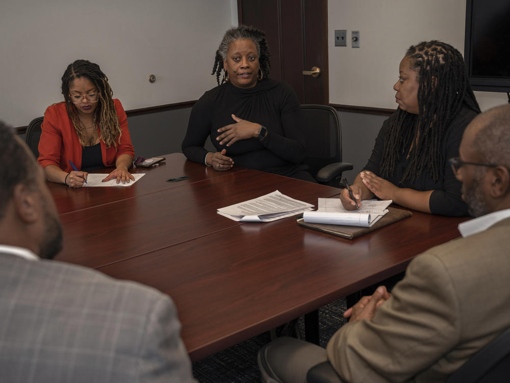 Members of the Black Equity Coalition, a grassroots team of researchers and advocates, meet regularly to discuss how they can use data to uncover life-threatening disparities between white and Black Pittsburgh. Clockwise, from top left are Kellie Ware, Karen Abrams, Tiffany Gary-Webb, Mark Lewis and Fred Brown.