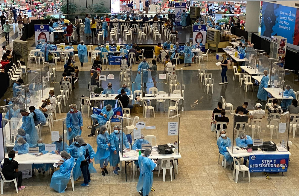 A scene from the Glorietta Shopping Mall vaccination effort. Even after its successful vaccination drive the country has inoculated just over a third of its 110-million people. By contrast, Vietnam has immunized 55% of its population, and Cambodia has fully vaccinated 81%.