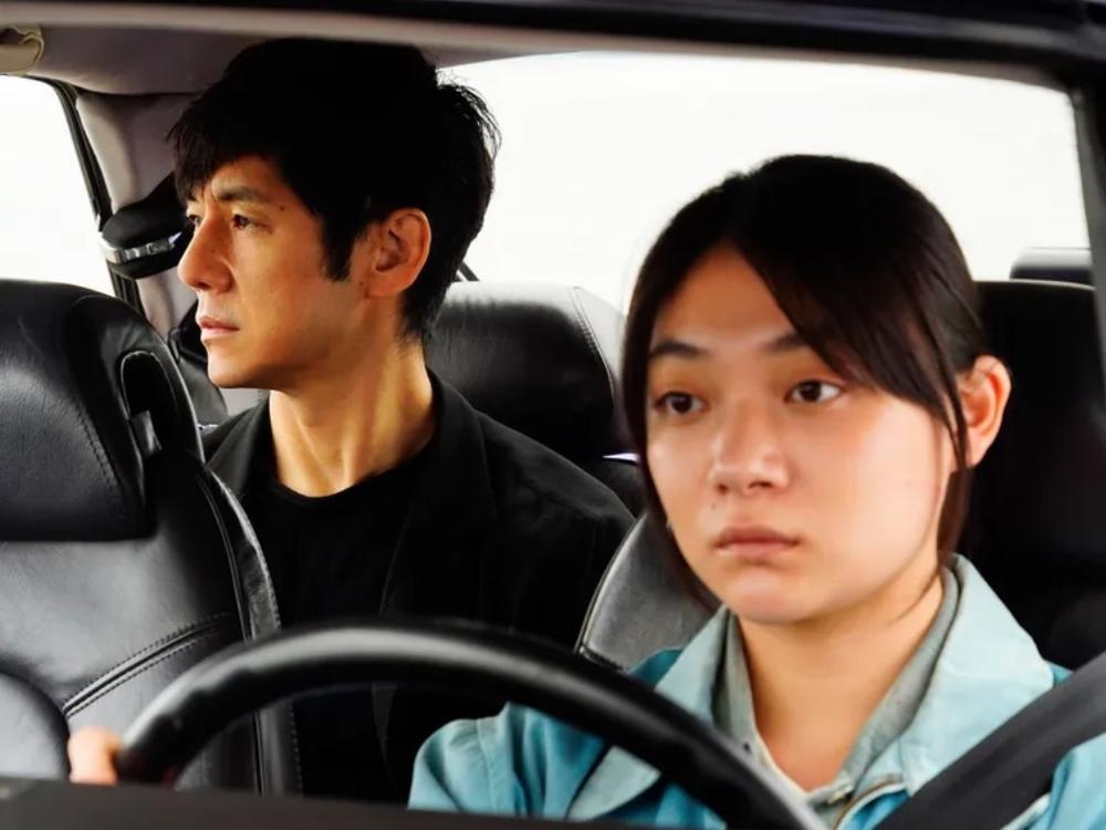 Misaki (Tôko Miura) is the personal driver to a grieving actor (Hidetoshi Nishijima) in  <em>Drive My Car.</em>