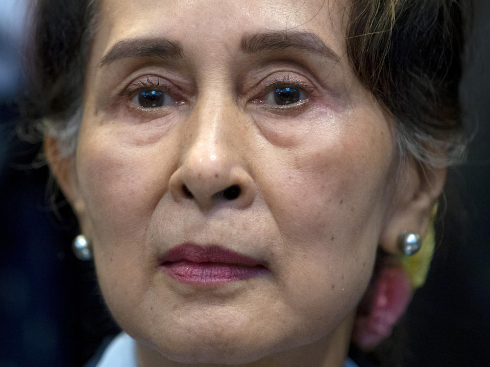 A Myanmar court on Monday sentenced ousted leader Aung San Suu Kyi to four years for incitement and breaking virus restrictions. In this photo from December 2019, Suu Kyi waits to address judges of the International Court of Justice on the second day of three days of hearings in The Hague, Netherlands.