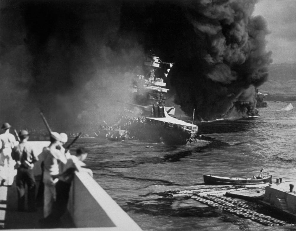 The USS California on fire in Pearl Harbor after the Japanese attack on December 7, 1941.