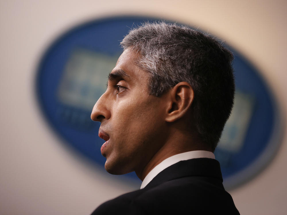 U.S. Surgeon General Vivek Murthy talks to reporters at the White House on July 15.