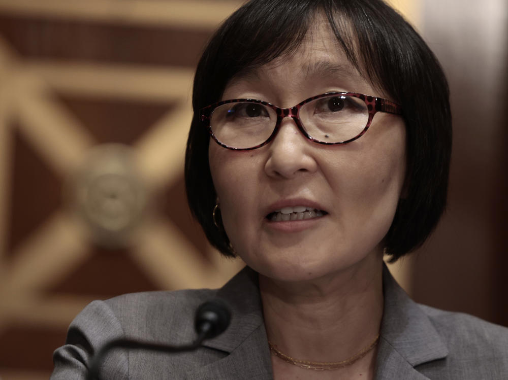 Saule Omarova addresses the Senate Banking Committee during her nomination hearing on Nov. 18 to head the Office of the Comptroller of the Currency. Omarova withdrew her nomination on Tuesday after facing opposition from Republicans and some moderate Democrats.