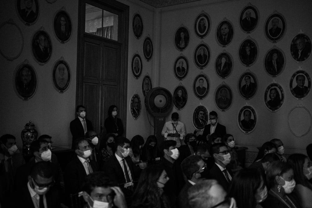 People attend a special session of court in the Palácio da Justiça cultural center in Manaus, on Aug. 24, 2021. Despite the event, most activities of the judiciary in Brazil's largest state only returned to 100% in person in November 2021.