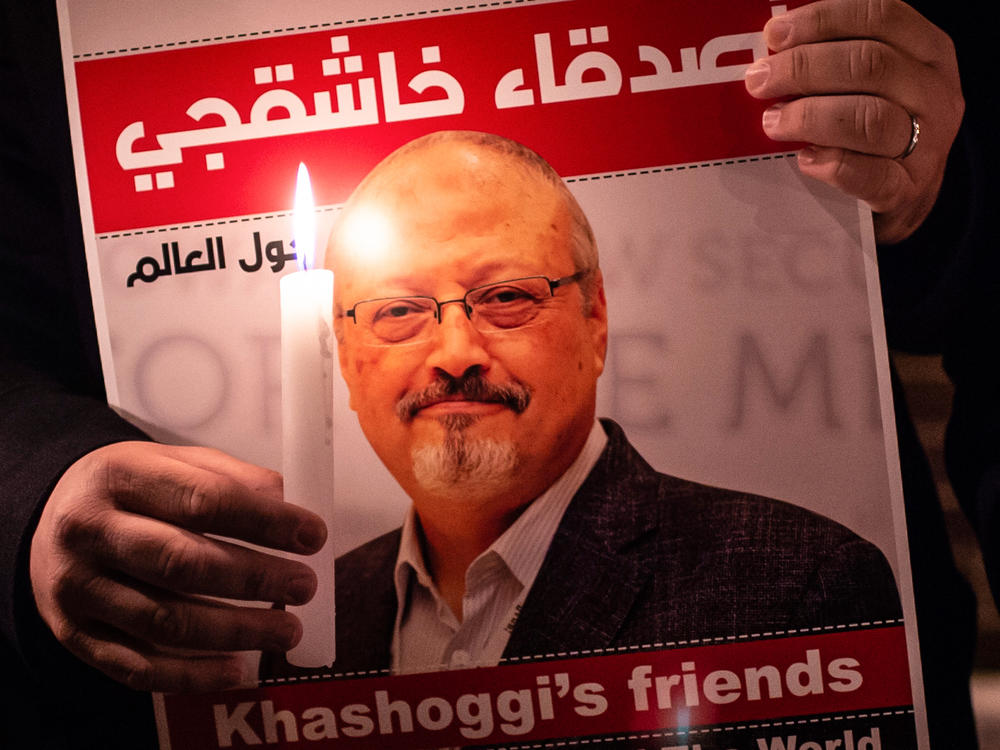 A demonstrator holds a poster of Saudi journalist Jamal Khashoggi during a gathering outside the Saudi Arabia consulate in Istanbul, on Oct. 25, 2018. Khashoggi, a Washington Post contributor, was killed on Oct. 2, 2018 after a visit to the Saudi consulate in Istanbul.