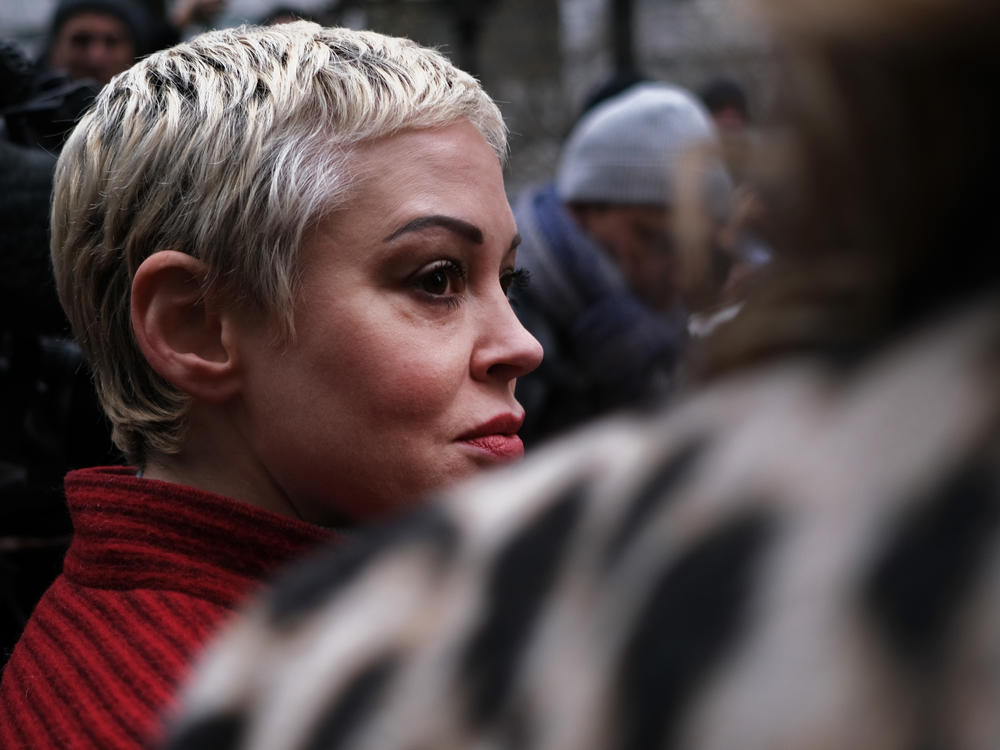 Actor Rose McGowan, who accused Weinstein of raping her more two two decades ago and then of destroying her career, joins other accusers and protesters as Harvey Weinstein arrives at a Manhattan court house for the start of his January 2020 trial in New York City.