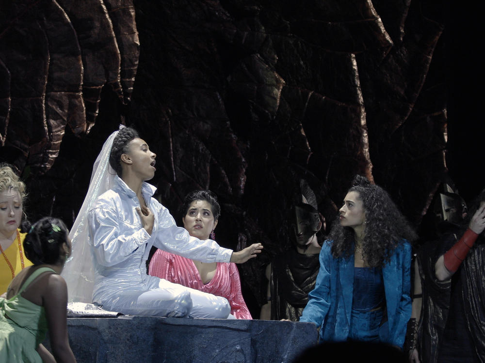 Iphigenia, played by esperanza spalding, prepares for her sacrifice. From Wayne Shorter and spalding's opera, <em>...(Iphigenia)</em>.