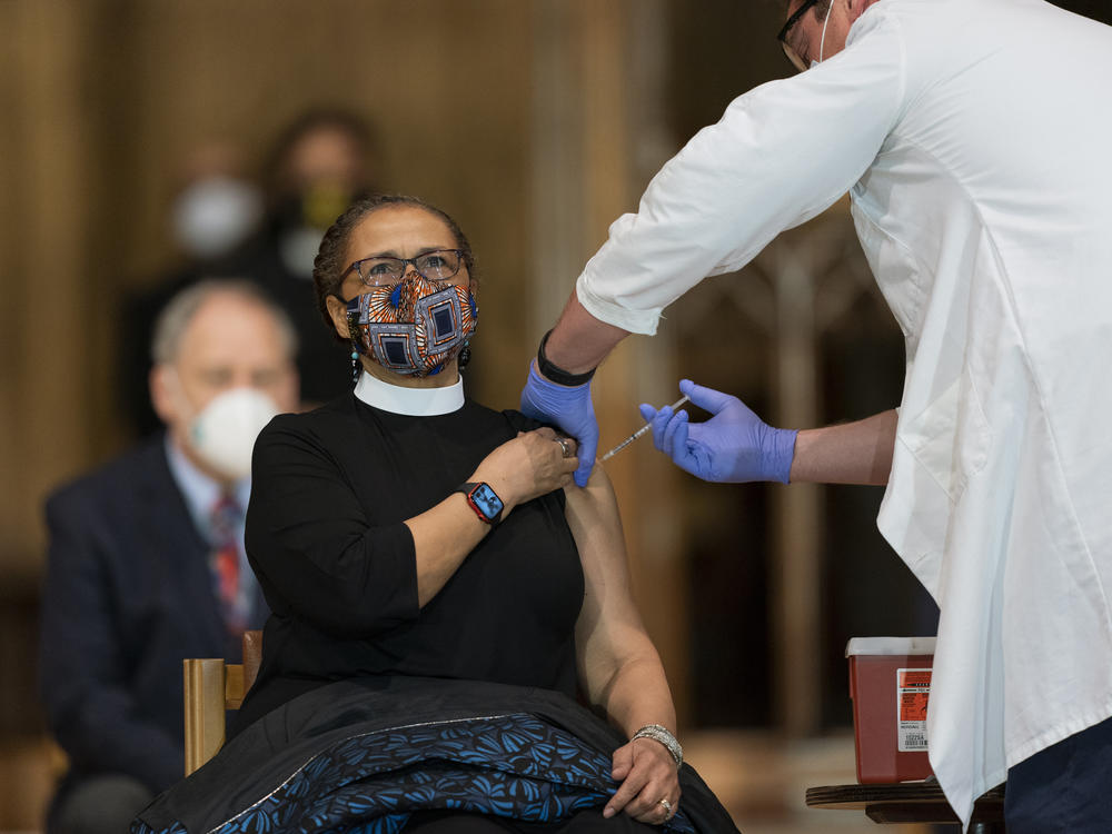 A pastor received the Johnson & Johnson COVID-19 vaccine in May, during a gathering of a group of interfaith clergy members, community leaders and officials at the Washington National Cathedral, to encourage faith communities to get the COVID vaccine.