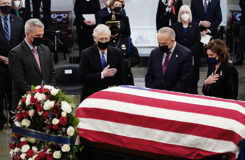 From left, House Minority Leader Kevin McCarthy, Senate Minority Leader Mitch McConnell, Senate Majority Leader Charles Schumer and Speaker of the House Nancy Pelosi pay their respects as former Republican Senator from Kansas Bob Dole, lies in state in the Rotunda of the U.S. Capitol in Washington, D.C., on Dec. 9, 2021.