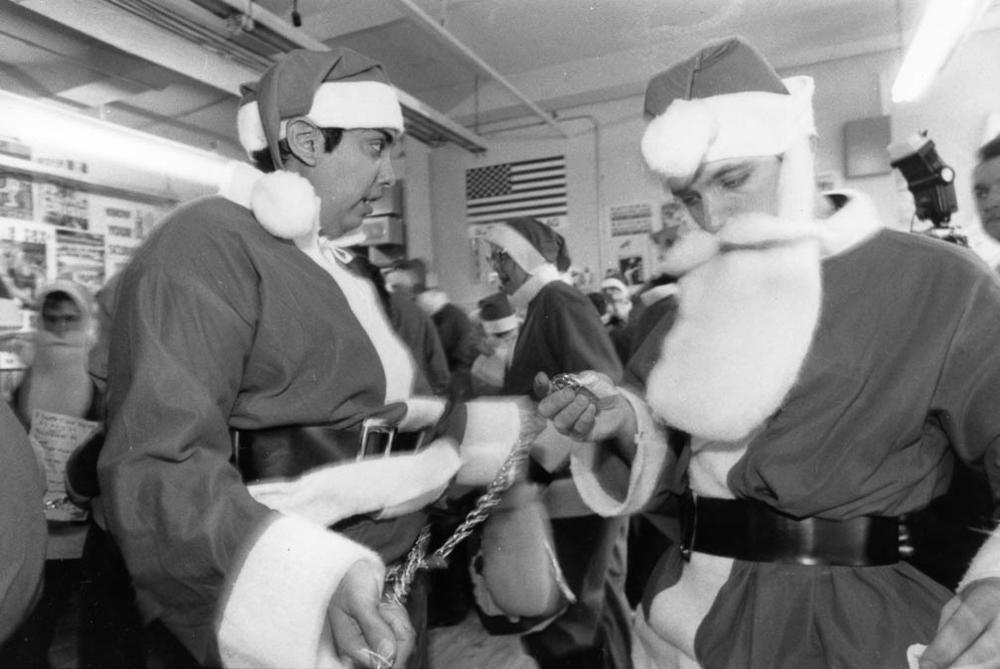 Jon Winkleman (right) and fellow Action Tour members are pictured dressing in preparation for the Macy's action on Nov. 29, 1991.