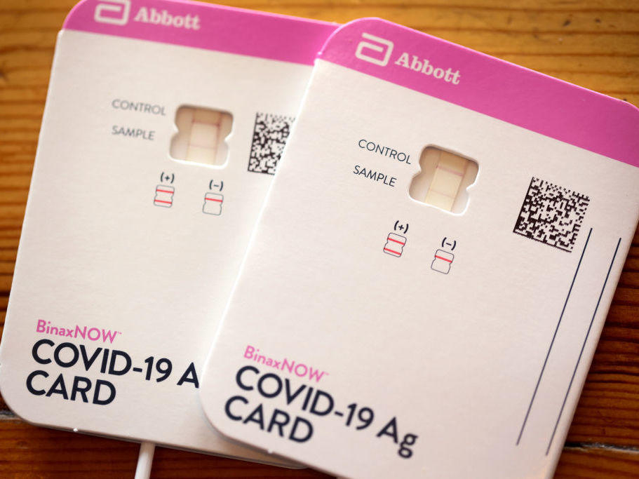 At-home rapid COVID-19 tests, like this one from Abbott, can be difficult to find and cost-prohibitive for some families.