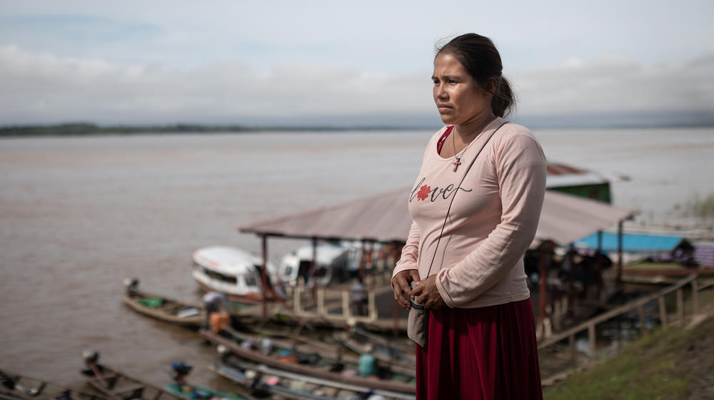 Nimia Uropari Velásquez, age 28, is a native of Peru's Manati indigenous community. She took a four-hour boat ride to the port town of Indiana to take care of banking business — and possibly get a vaccine. In the end she passed on the shot.