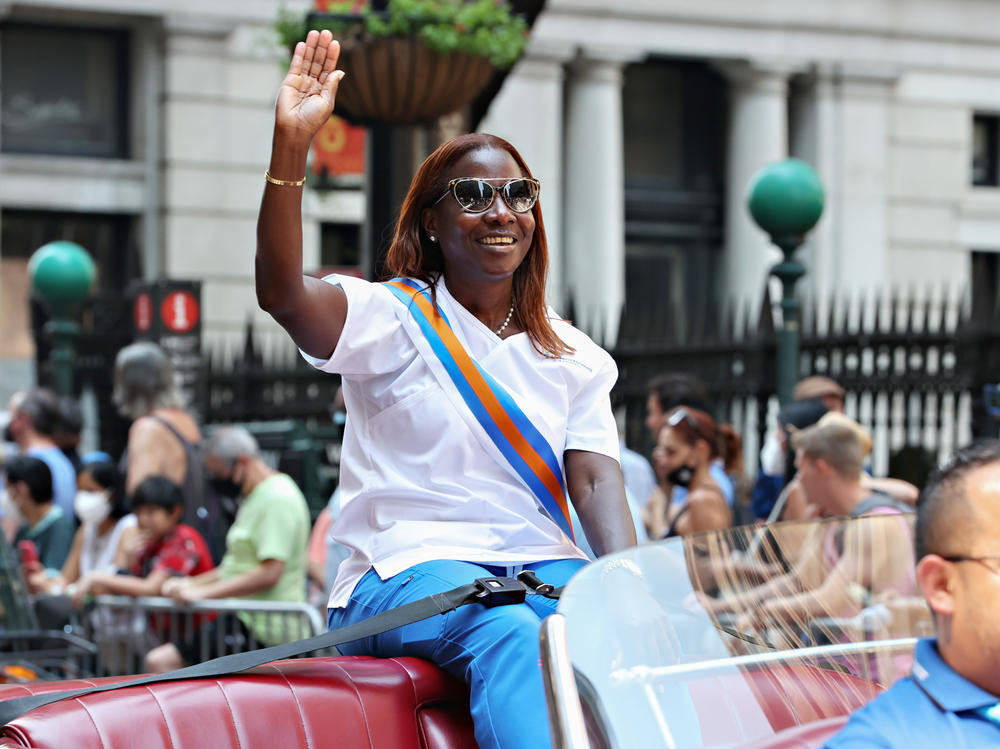 Nurse Sandra Lindsay, the first person in the U.S. to get the COVID-19 shot, serves as grand marshal of the Hometown Heroes Parade in New York City in July. The event honored essential pandemic workers.