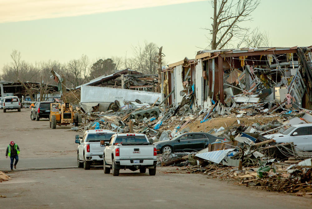 <strong>Sat., Dec. 11:</strong> Damaged homes and businesses are pictured on in Mayfield, Kentucky.