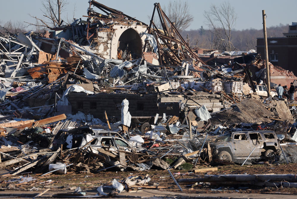 <strong>Sun., Dec. 12:</strong> Homes and business are reduced to rubble after a tornado ripped through  Mayfield, Kentucky.