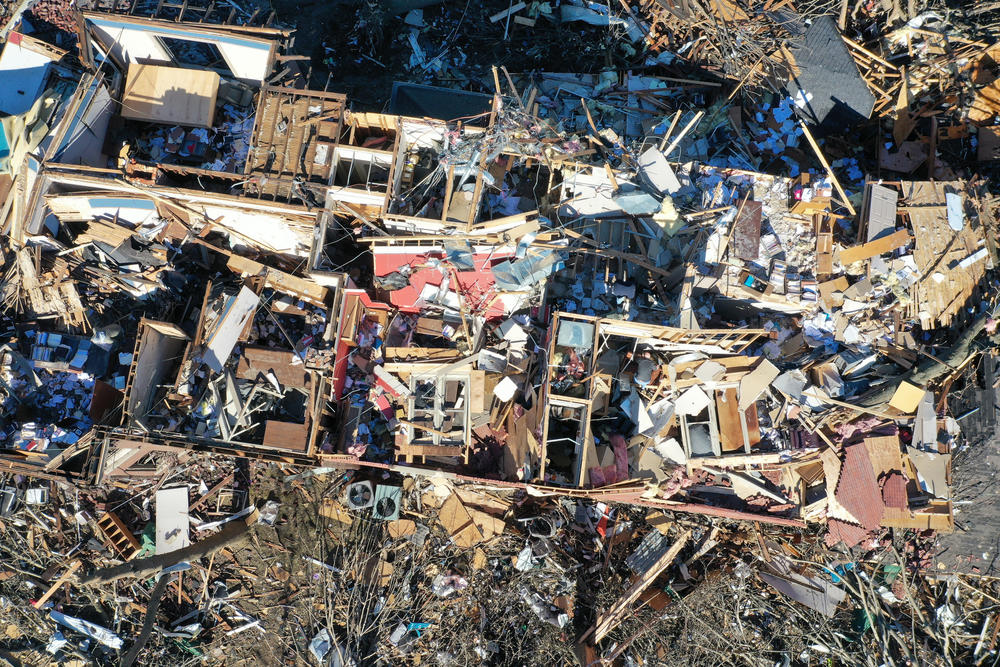<strong>Sun., Dec. 12: </strong>Salvage and cleanup continues after a tornado ripped through the area two days prior in Mayfield, Kentucky.