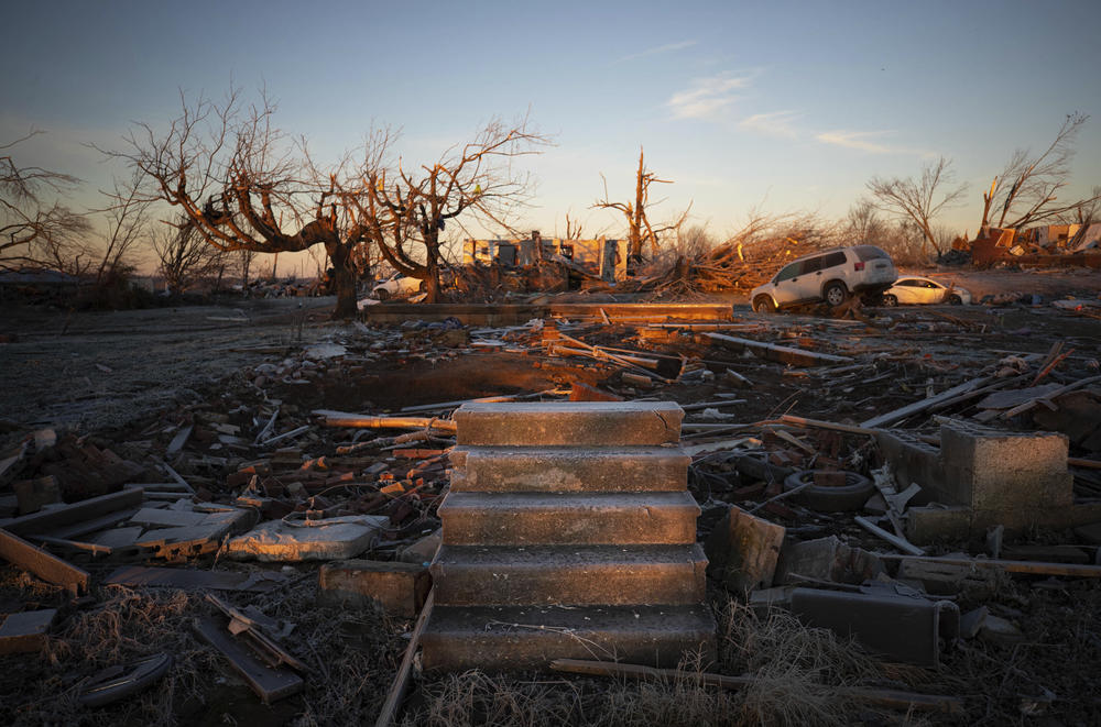 <strong>Sun., Dec. 12: </strong>The front steps of a house are all that remains after a tornado in Dawson Springs, Ky.