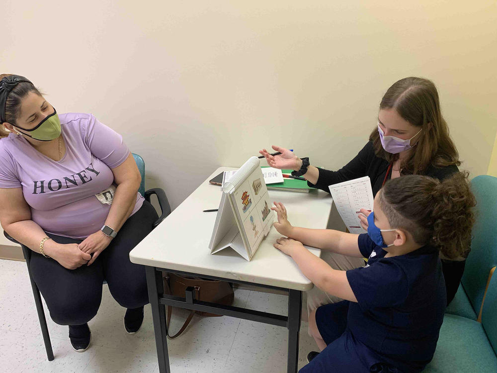 Yariel answers a series of questions from research coordinator Elizabeth Corn at Children's National Hospital in Washington, D.C.