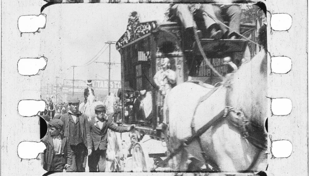 This still from a film showing the Ringling Bros circus parading through a prosperous Black neighborhood in Indianapolis, is a rare cinematic glimpse of Black people in film without racist portrayals.