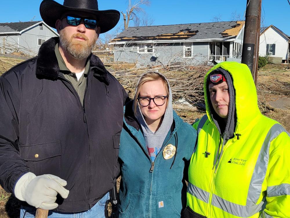 Chief Geoffrey Deibler and dispatchers Meghan Collier (center) and Bobbie Brown of the Morganfield Police Department traveled to nearby Dawson Springs, Ky., to help look for survivors.