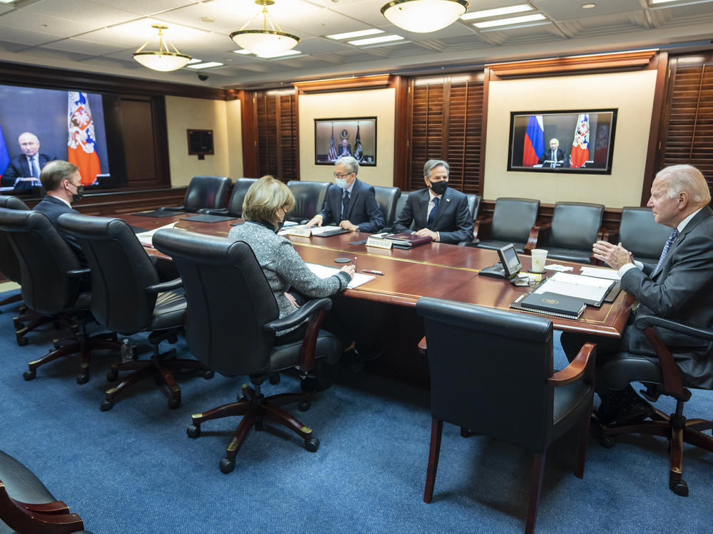 President Joe Biden speaks as he meets virtually via a secure video conference with Putin from the Situation Room at the White House on Dec. 7. Putin urged the West to make a legal pledge not to deploy forces and weapons to Ukraine.