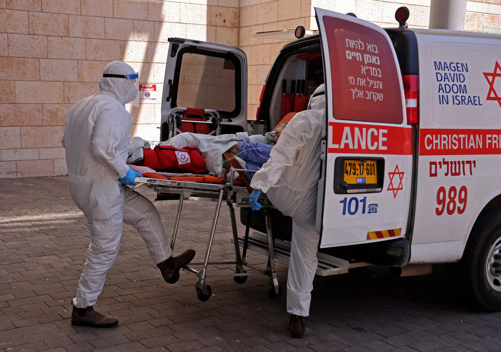 Medics in Jerusalem transferred a COVID-19 patient to Hadassah Hospital Ein Kerem. Many hospitals in Israel were at full capacity this summer following a sharp increase in coronavirus infections.