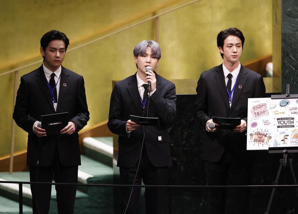 V (from left), Suga and Jin of BTS at the launch of the U.N. General Assembly's 76th session. The popular boy band from South Korea sang (in a video performance viewed online by more than 1 million) and spoke.