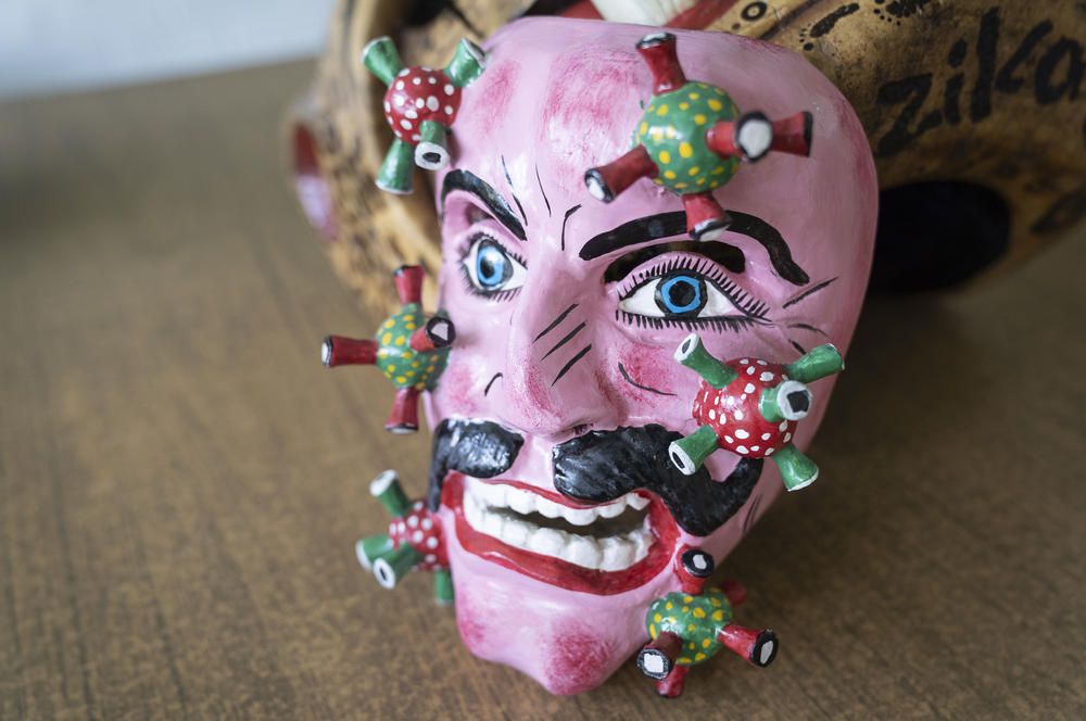 <em>Mestizo Man</em>, created by Nahua artisan Zeferino Baltasar Basilio, symbolizes COVID-19, which was seen as having foreign origins, as an outsider.