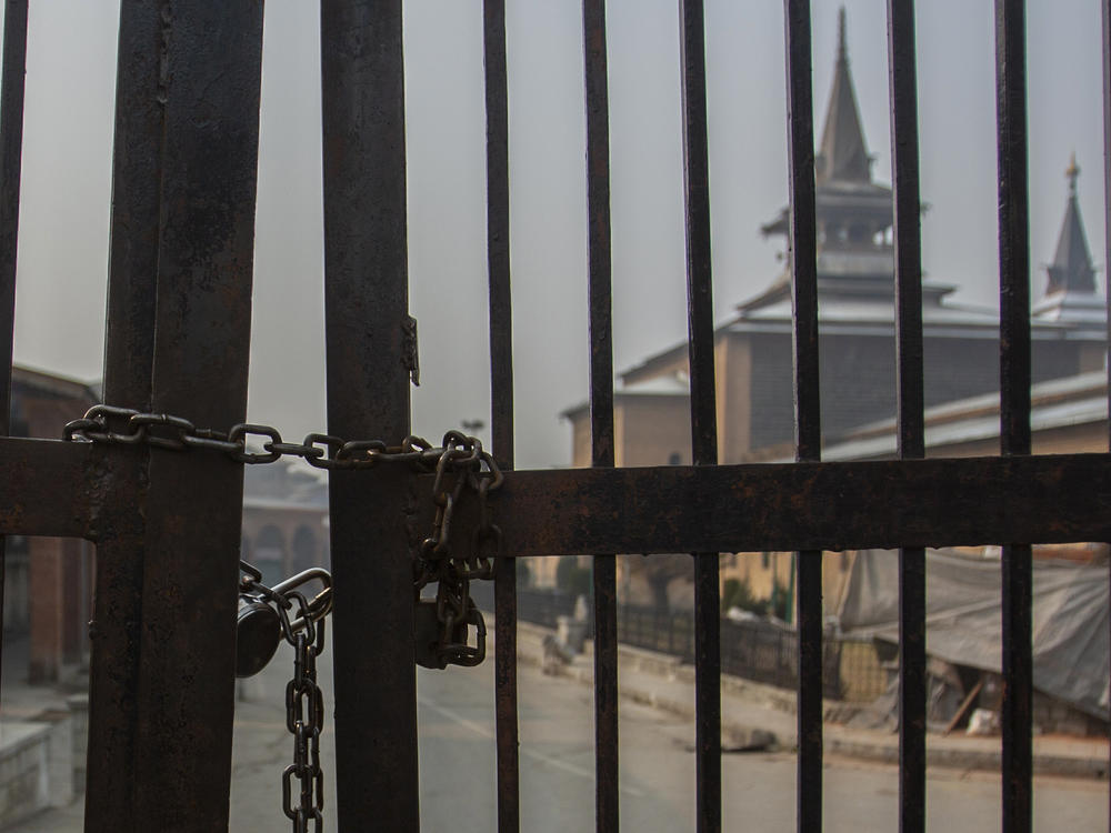 Kashmir's Jamia Masjid, or the grand mosque is seen through its gate that remains locked on Fridays in Srinagar, Indian controlled Kashmir.