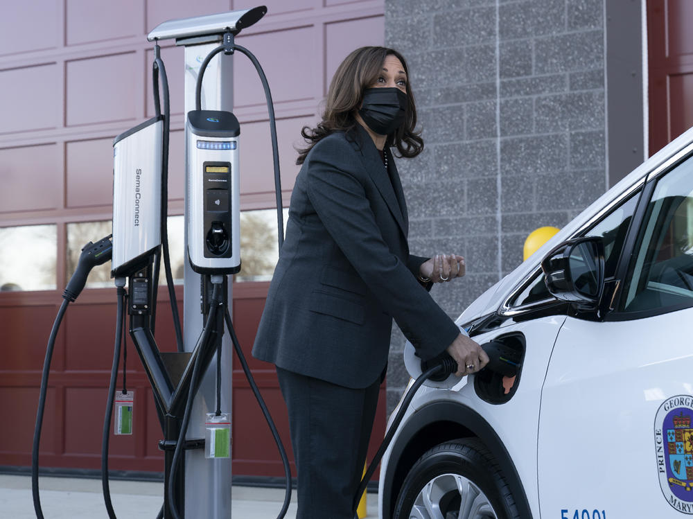 Vice President Harris charges an electric vehicle during a tour of the Brandywine Maintenance Facility in Prince George's County, Md. There, she highlighted electric vehicle investments.