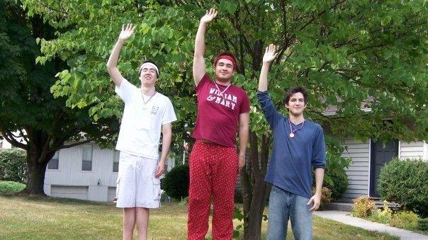Eric Cunningham (right) with his brothers Andrew (center) and Joshua at the medal ceremony for their 2008 