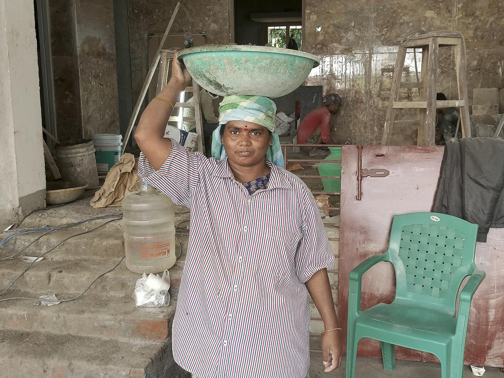Selvi is a construction worker in Chennai, India. 