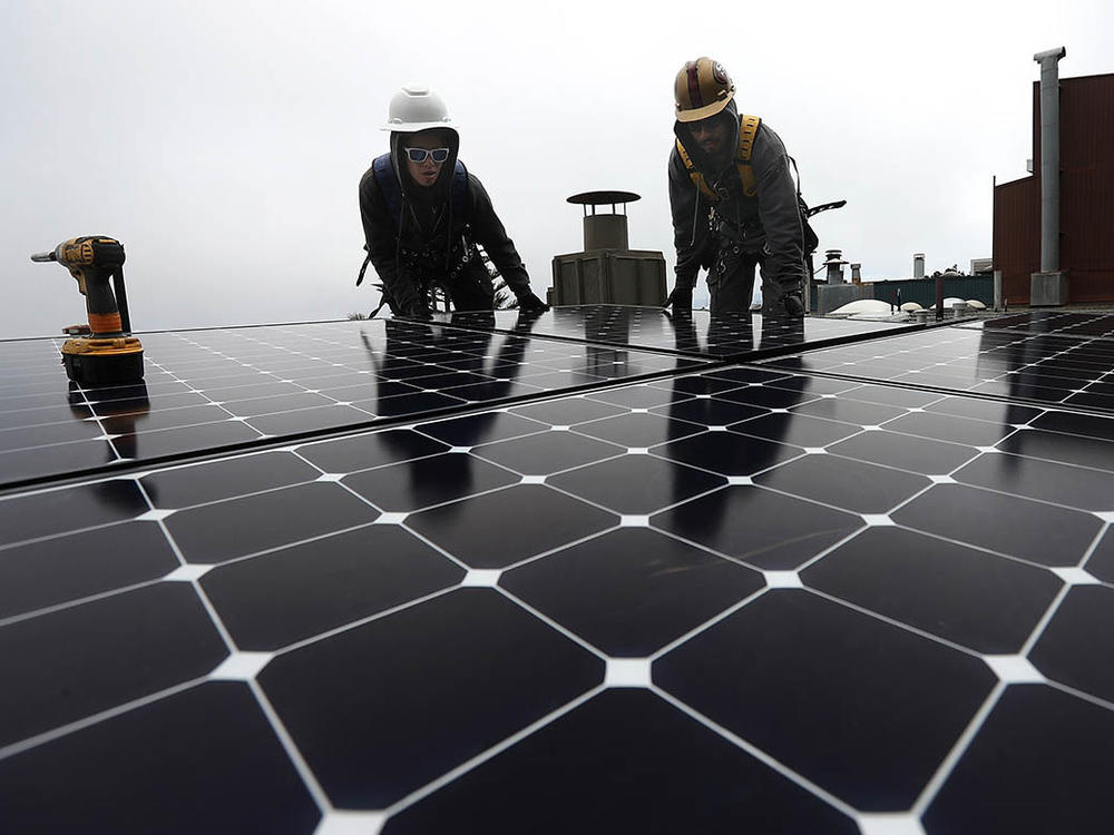 The Build Back Better legislation included billions to accelerate clean energy like rooftop solar, but with the bill now stalled in Congress, cutting U.S. emissions will be tougher.