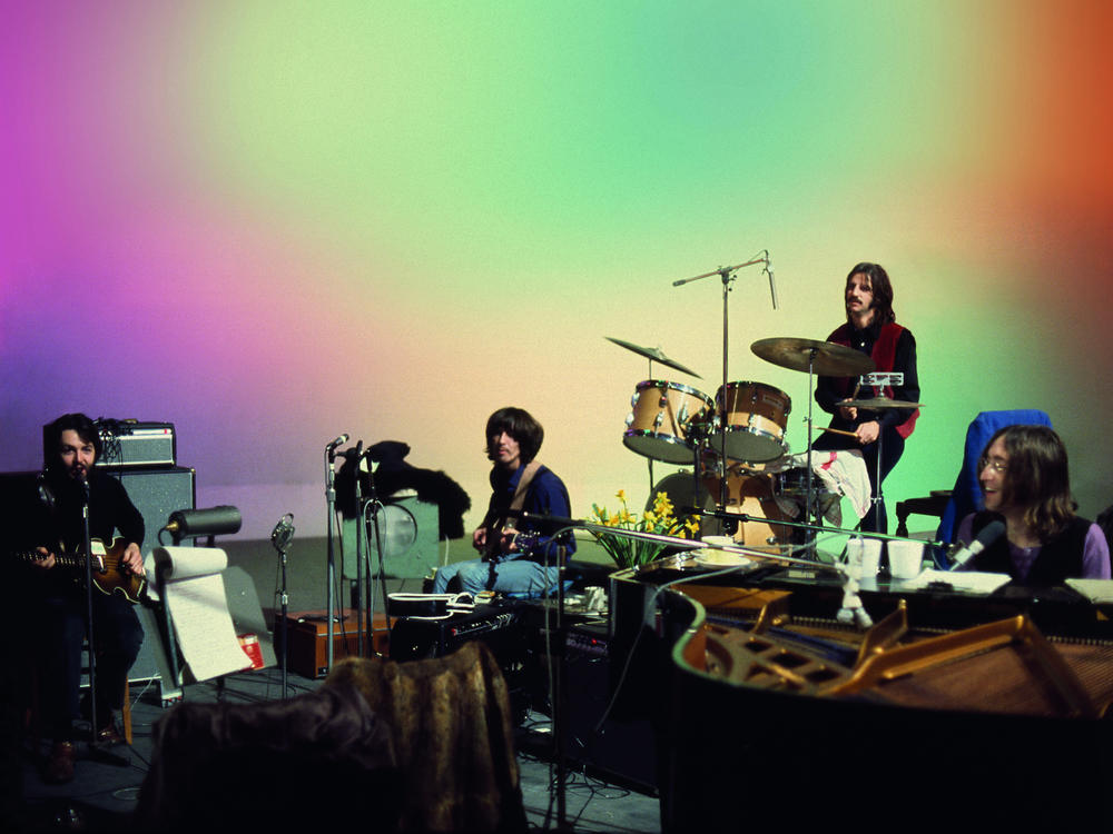 The Beatles on Mount Doom (or a still from Peter Jackson's <em>Get Back</em>, a documentary constructed from footage shot during the making of the band's last studio albums and final performance).