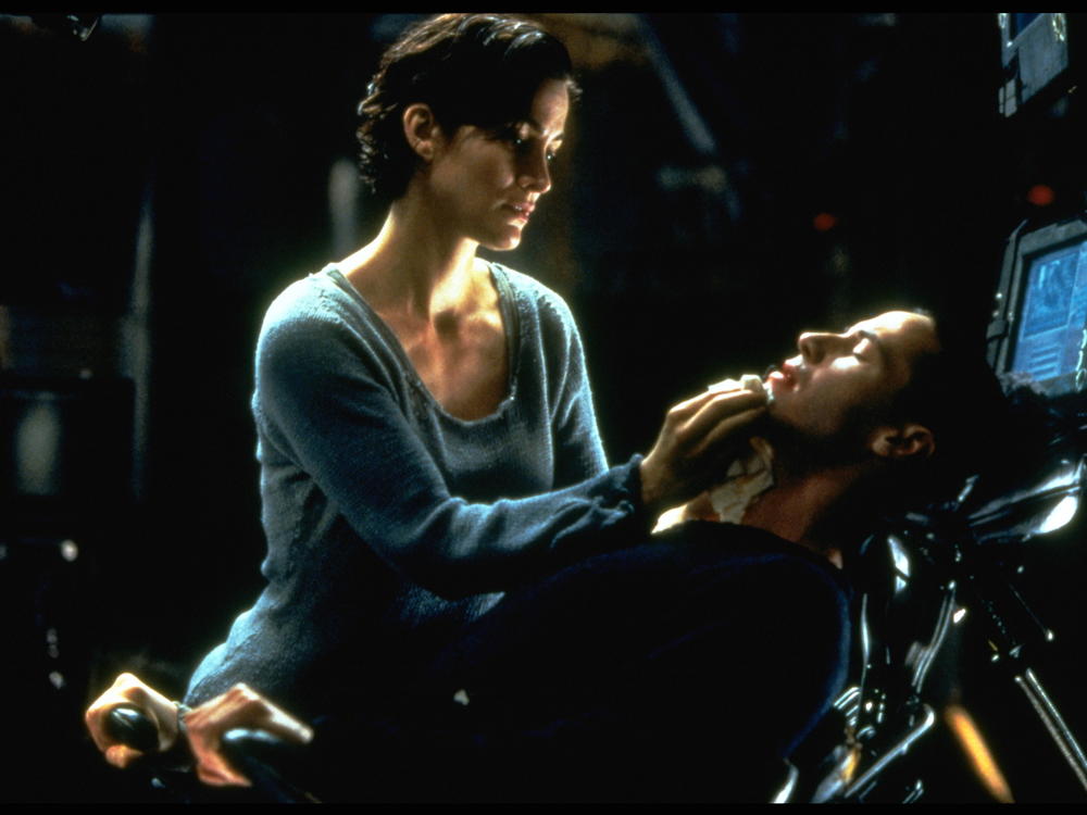 Carrie-Anne Moss and Keanu Reeves in The Matrix