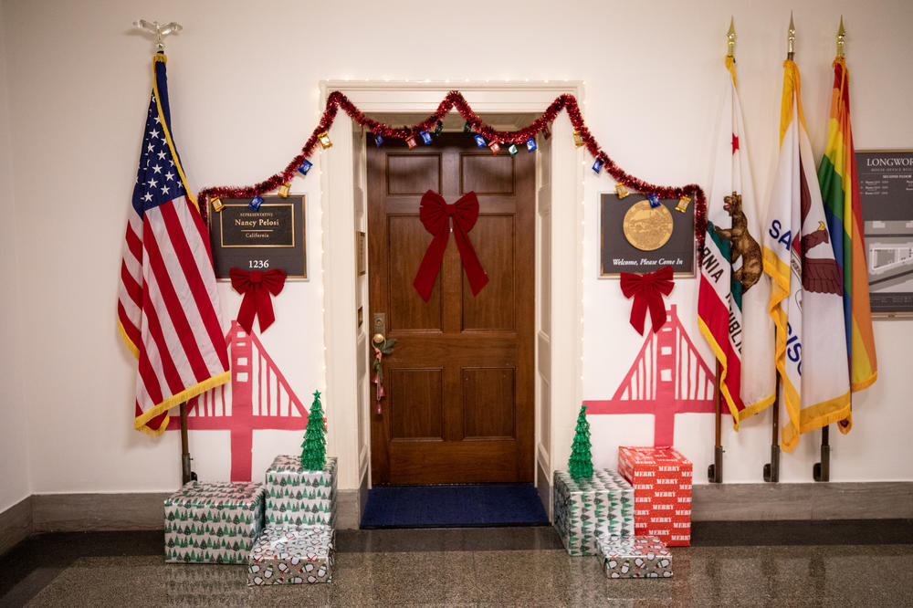 House Speaker Nancy Pelosi's office is decorated for the holidays and has a paper Golden Gate Bridge on either side of the door.