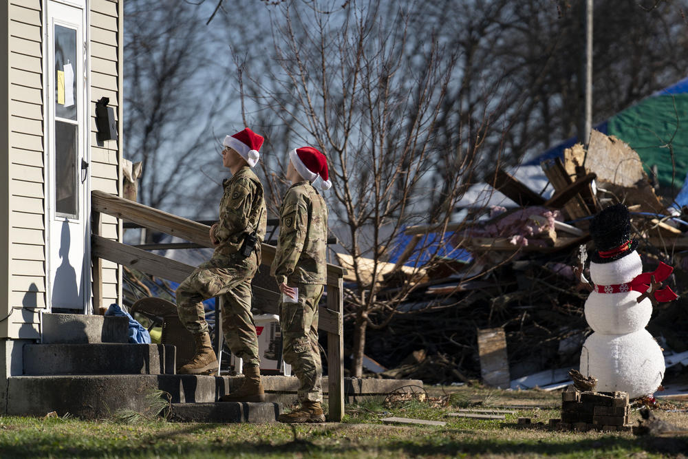 Members of the 1123 Sappers, Kentucky National Guard, perform a health and wellness check in Mayfield, Ky.