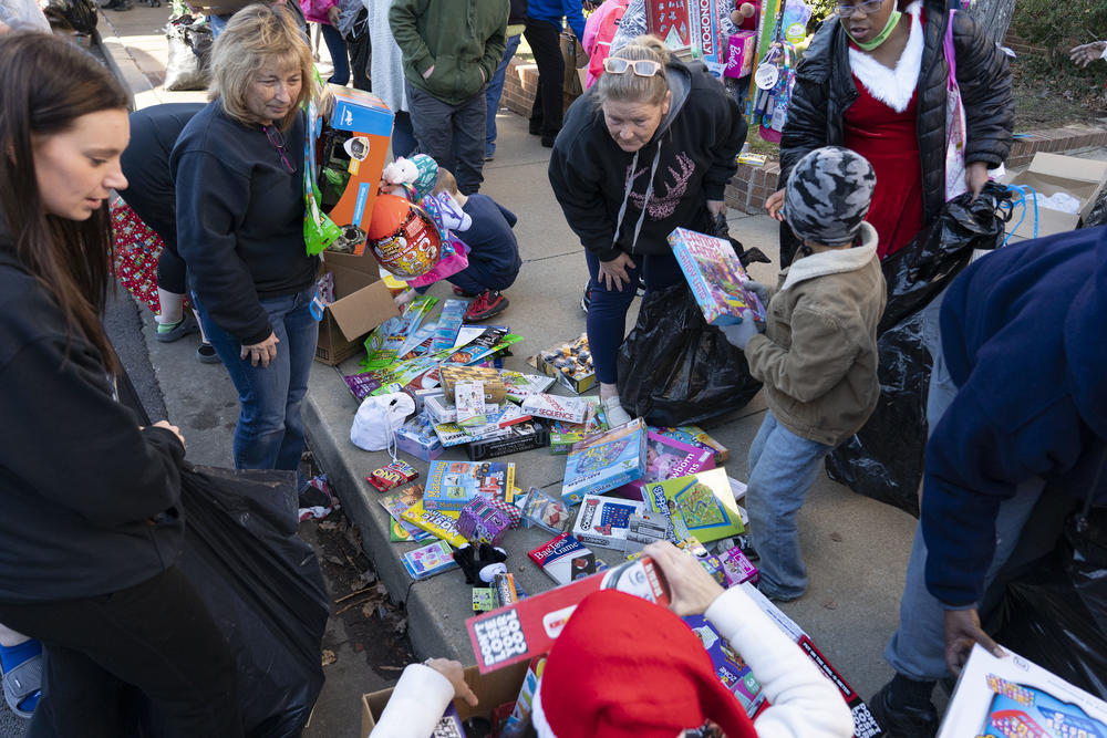 Volunteers and community members attend the WPKY toy drive in Princeton, Ky.