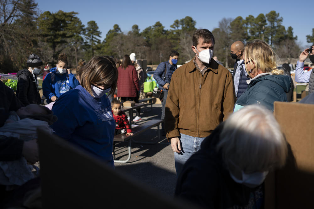 Kentucky Gov. Andy Beshear attends the Christmas toy drive at Kentucky Dam Village State Resort Park in Gilbertsville, Ky.