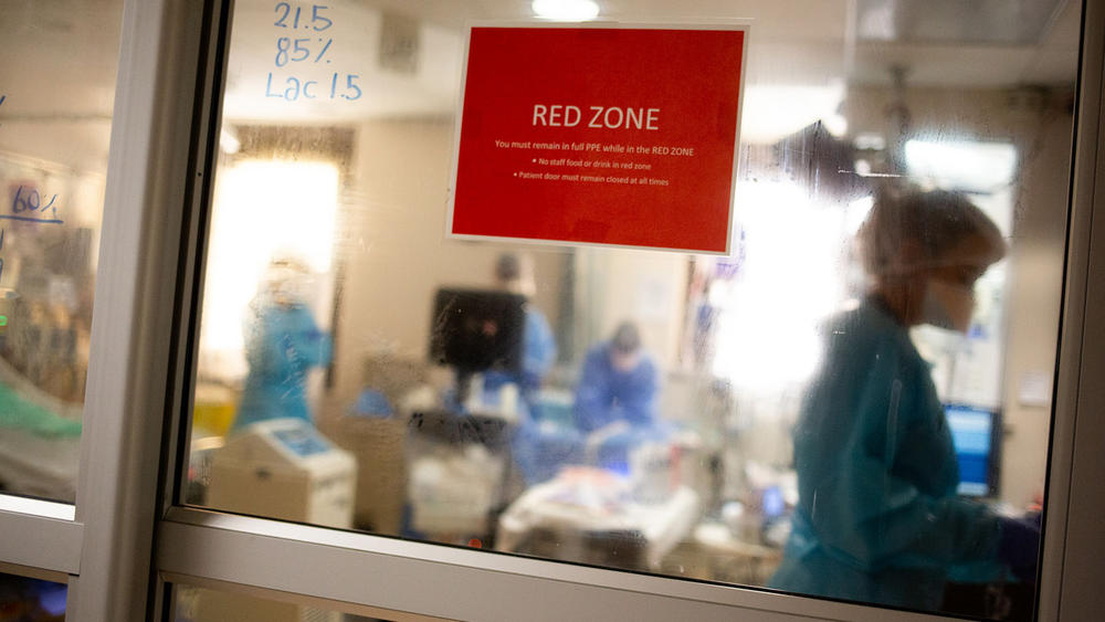 The COVID ICU has a red zone that's sealed with negative pressure air to keep the airborne virus particles from leaving the room. Staff are required to wear full PPE, including N-95 respirators and eye protection, for most of their 12-hour shifts.<strong> </strong>