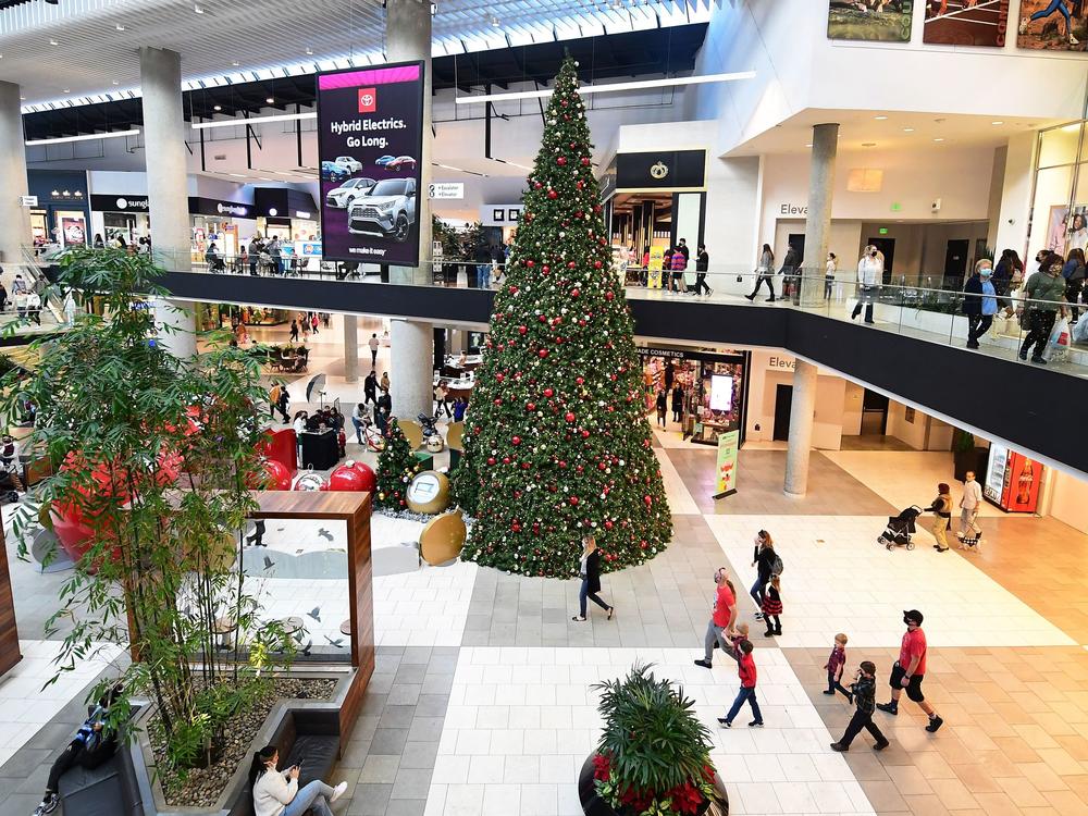 People walking at a shopping mall in Santa Anita, Cali. A majority of retailers and businesses across the country will close their doors early on Friday ahead of the Christmas holiday this year.