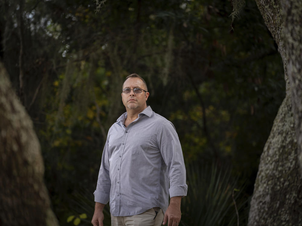 Joseph Moore stands for a portrait at a park in Jacksonville, Fla., earlier this month. Moore worked for nearly 10 years as an undercover informant for the FBI, infiltrating the Ku Klux Klan in Florida, foiling at least two murder plots, according to investigators, and investigating ties between law enforcement and the white supremacist organization.