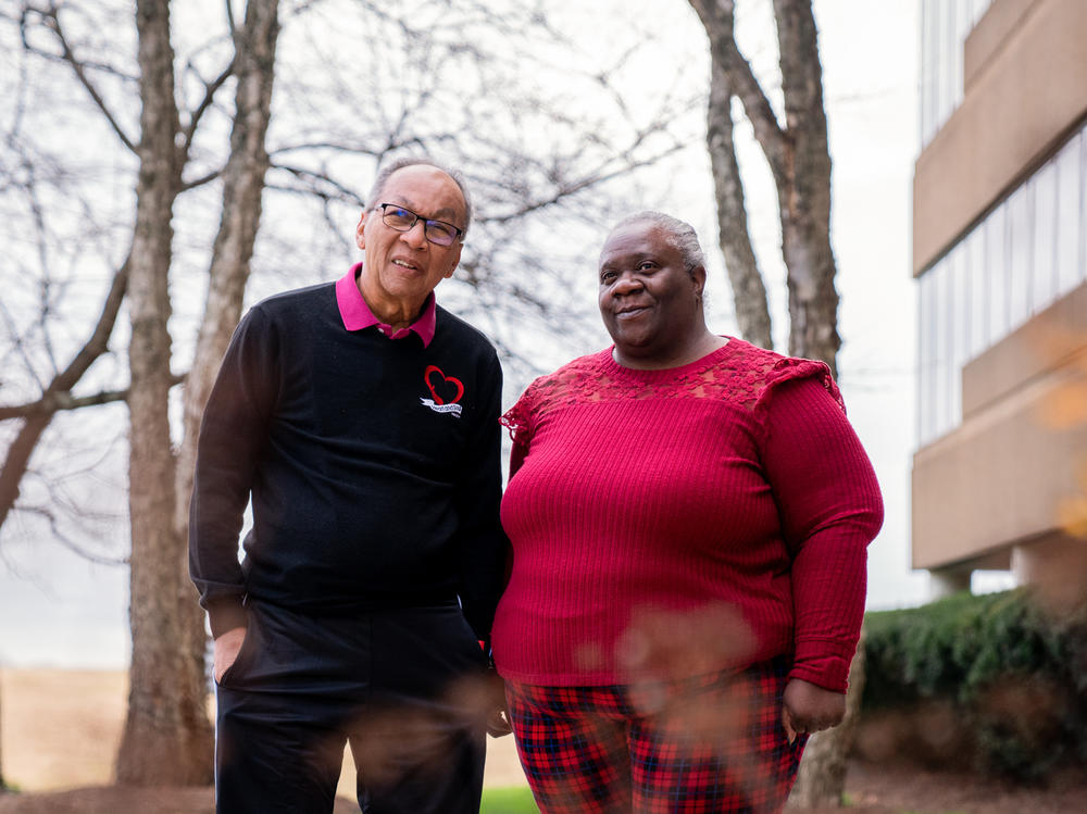 André Lee, administrator and co-founder of Heart and Soul Hospice, stands with Keisha Mason, director of nursing, in front of their office building last week in Nashville, Tenn.
